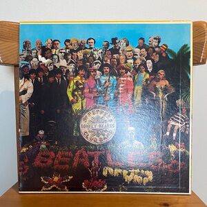 The Beatles Sgt. Pepper's Lonely Hearts Club Band Vinyl with original cut outs